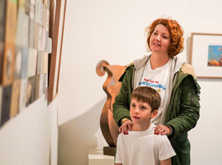 Family looking at art