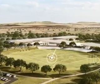 Artists image of a circular grass sports field with a border of trees around the oval.