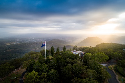 Aerial photo of Picnic Point flagpole amongst large mature trees.