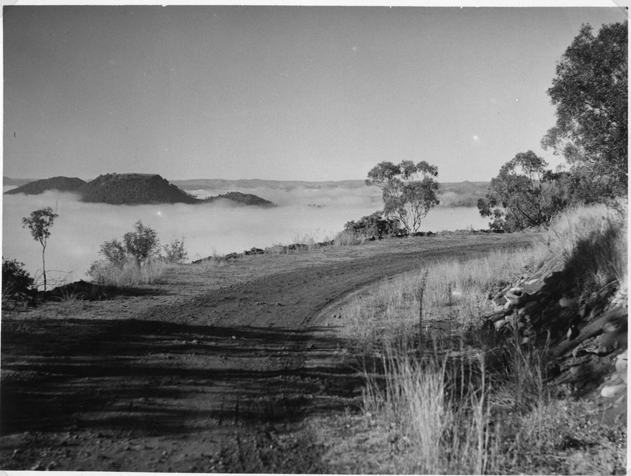 Black and white photo of Katoomba point. Taken from dirt road looking out over the Lockyer Valley and surrounds.