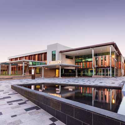 Toowoomba City Library external entry at dusk.